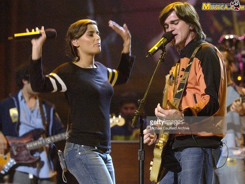 Fondo de pantalla de Juanes & Nelly Furtado