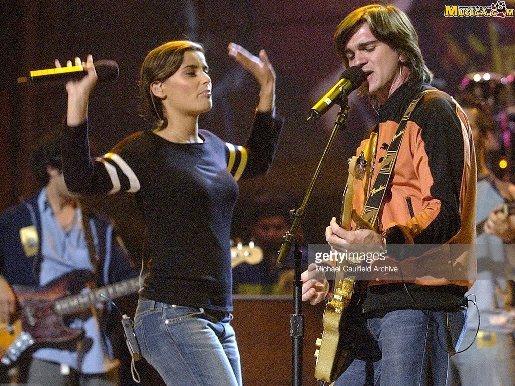 Fondo de pantalla de Juanes & Nelly Furtado